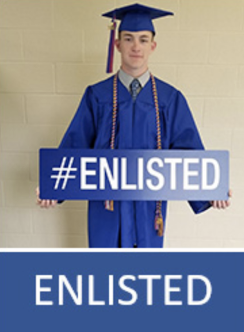 logan county graduate holding an enlisted sign